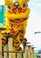 Yellow chinese lion dancing on the foothold