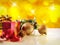 Yellow Christmas decoration with two balls and gift Horizontal c