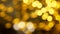 Yellow Christmas illumination in defocus. Bokeh background