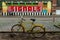 A yellow city bike in the foreground, must send out signals in the background