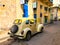 Yellow classic Cuban vintage car. American classic car on the road in Havana, Cuba.