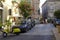 Yellow classic moped parked in old center of Ragusa Ibla on August 11, 2017, Sicily, Italy