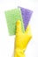 A yellow cleaning glove with a sponge