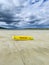 Yellow coast guard rescue surfboard at Narin Beach by Portnoo, County Donegal - Ireland