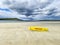 Yellow coast guard rescue surfboard at Narin Beach by Portnoo, County Donegal - Ireland