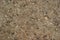 Yellow cobblestone gravel stones boulders pebbles texture background close-up