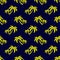 Yellow coconut trees on a dark, blue background. Seamless background.