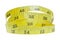 Yellow coiled tape measure on white background with wit