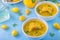 Yellow color cold soup is sweet corn gazpacho