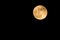 Yellow color full moon in dark sky at night