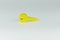 Yellow color key shape door stopper isolate on grey background