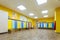 Yellow colored changing room and lockers of kindergarten for children