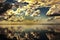 Yellow colored cumulus cloud, sunset seascape.