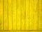 Yellow colored old wood plank texture background