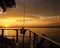 Yellow coloured stratus cloud, sunset seascape.