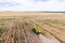 Yellow combines harvests rye