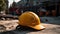 Yellow construction crane on a background of a construction site. In the foreground.