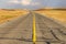 Yellow continuous strip on the asphalt road, Inner Mongolia