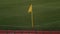 Yellow corner flag marks playing area in pitch, soccer equipment, game rules