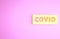 Yellow Corona virus covid-19 icon isolated on pink background. Bacteria and germs, cell cancer, microbe, fungi