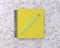 Yellow cover notebook with blue pencil on marble background. Min