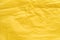 Yellow creased paper tissue background texture