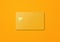 Yellow credit card on a color background