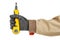 Yellow crimping tool for computer network socket in electrician fist in black protective glove and brown uniform isolated on white