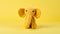 Yellow Crocheted Elephant Toy On A Vibrant Background