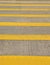 Yellow crosswalk on the road