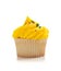 Yellow Cupcake with sprinkles on white