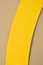 yellow curve paper put on brown background, paper industry