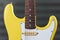 Yellow custom Fender electric guitar