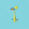 Yellow Cute kids toothbrush, sun, rainbow on blue background. Dental and healthcare concept, copy space, 90s, 80s style design,