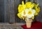 Yellow daffodil bouquet in cone
