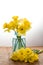 Yellow dafodills in blue jar