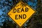 Yellow dead end road sign