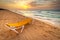 Yellow deckchair at Caribbean sunrise