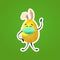Yellow decorated egg with rabbit ears in medical mask happy easter spring holiday coronavirus pandemic