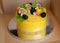 Yellow delicious amazing  cake with fruits