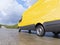 Yellow Delivery Commercial Van on Countryside Road Motion Blurred 3d Illustration