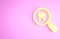 Yellow Dental search icon isolated on pink background. Tooth symbol for dentistry clinic or dentist medical center