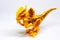 Yellow dinosaur toy on isolated white background