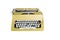 Yellow dirty Retro typewriter with clipping path isolated on white