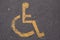 Yellow disabled symbol on pavement Maghull May 2020