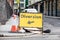 Yellow diversion road sign in a UK city street