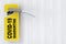 Yellow Do Not Disturb Door Label with COVID-19 Quarantine Sign on a Hotel, Home or Room Door Handle. 3d Rendering