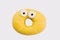 Yellow donut with funny eyes.