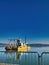 yellow dredger in trasimeno lake