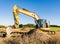 Yellow earth mover at a construction site